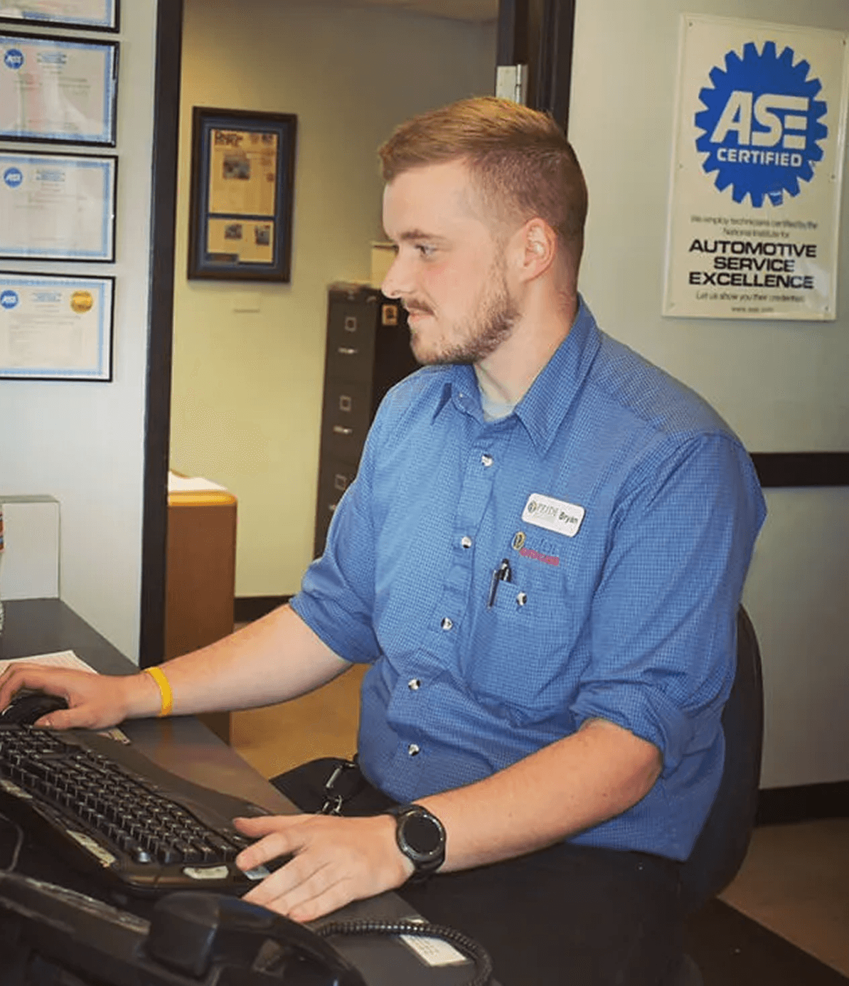 Pride Auto Care technician providing professional automotive service