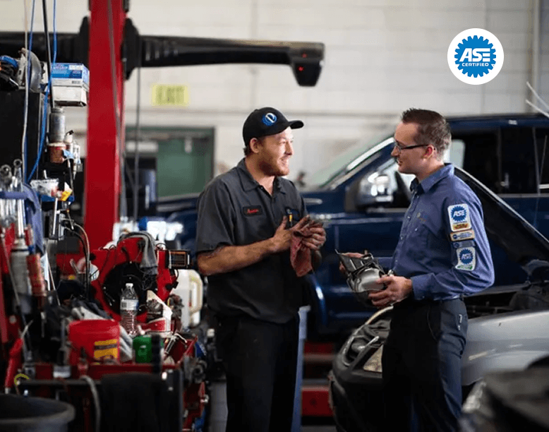 Pride Auto Care technician providing professional automotive service